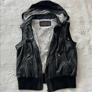 YMI Black Hooded Faux Leather Vest With Faux Fur Lining and Removable Hood. Lg